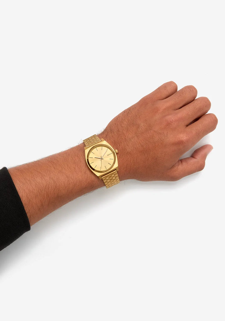 Nixon gold watch online red face